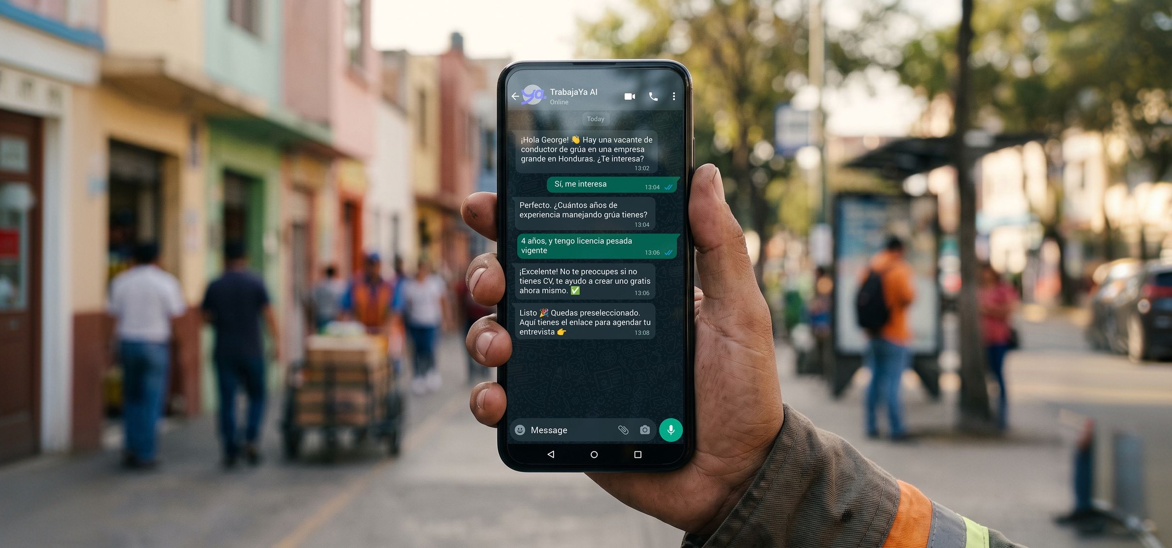 A candidate's hand holding a phone mid-conversation with TrabajaYa AI on WhatsApp, on a busy LATAM street